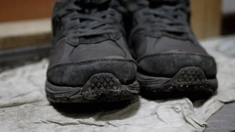 Close-Up of Dirty Sneakers Stock-Footage 312010098