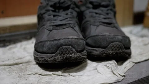Close-up of Dirty Sneakers Stock Footage 312010502