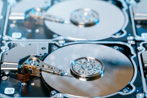 Close up of disassembled hard disk with abstract reflection Stock Photos