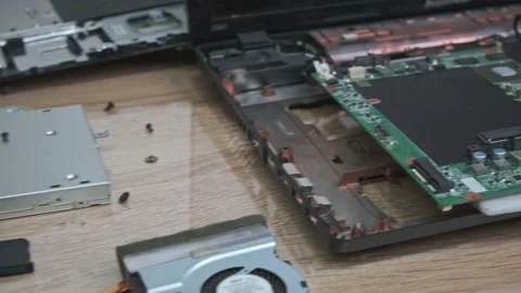 Close-up of a disassembled laptop. Workflows in the workshop. Stock Footage 130779602