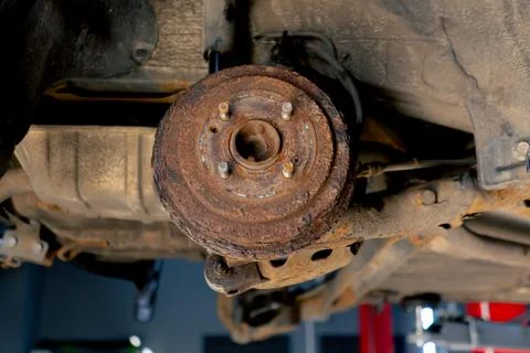 Close-up of disassembled machine part for work with installation by bolts car on Stock Photos