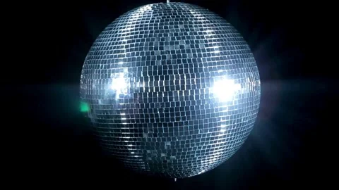 Close up disco ball against a dark background. Disco ball reflection light .. Stock Footage 265755723