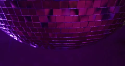 Close up of a Disco Ball with Purple Lighting Stock Footage 328016823