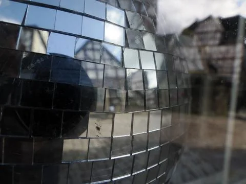 Close-Up Disco Ball Reflecting Half-Timbered Building Outdoors Stock Photos