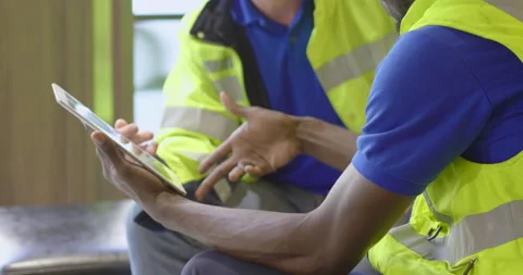 Close up discuss and strategy plan in tablet of two diversity African and Cau Video stock 150418906