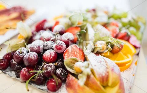Close up of dish with sugared fruit dessert Stock Photos