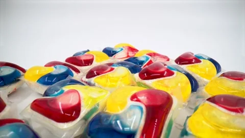 Close up of dishwasher detergent tabs on white background isolated Stock Footage 332124544
