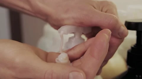 Close-up of the disinfection process, squeezing out a special gel cream in a Stock Footage 155739625