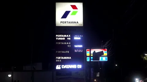 Close-up display of a Pertamina petrol station LED light board informing prices Video stock 339500163