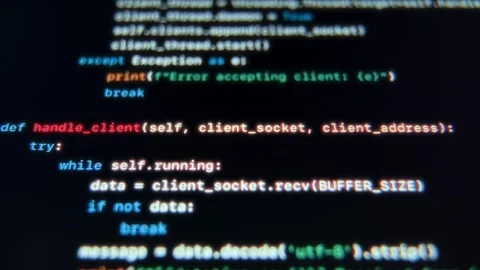 Close-up display of technical coding scripts on a screen Stock Footage 296120447
