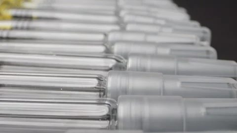 Close-up of disposable syringes for vaccinations or subcutaneous injections.. Stock Footage 303573055