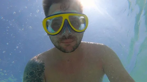 Close-up of a diver’s face Stock Footage 123974286