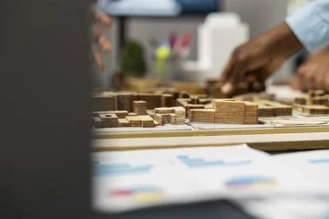 Close up of diverse developers focuses on 3D models layout presentations Stock Photos