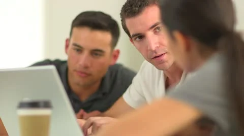 Close up of diverse group of office workers at laptop Stock-Footage 22358369