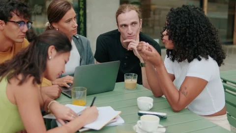 Close up of a diverse group of students using computer. Focus on the African Stock Footage 300127274