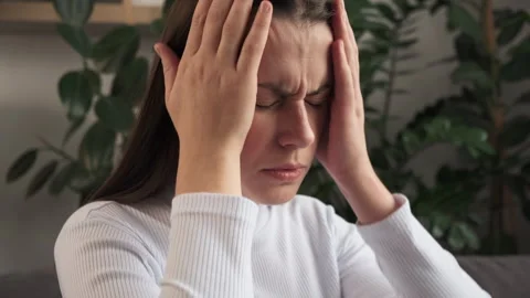 Close up of dizzy woman headache or migraine pain suffering from vertigo or sick 스톡 동영상 289062907