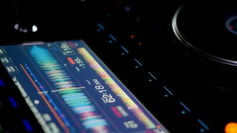Close Up Of DJ Controller Screen Displaying Audio Waveform.  Professional DJ Dis Stock Footage 335933143