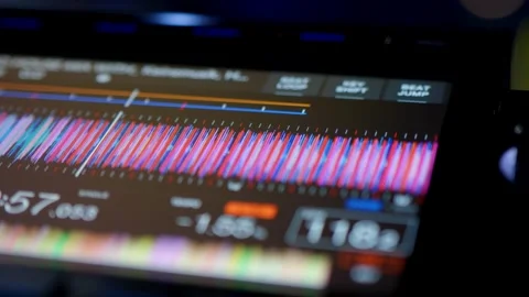 Close Up Of DJ Controller Screen Displaying Audio Waveform.  Professional DJ Dis Stock Footage 335933260
