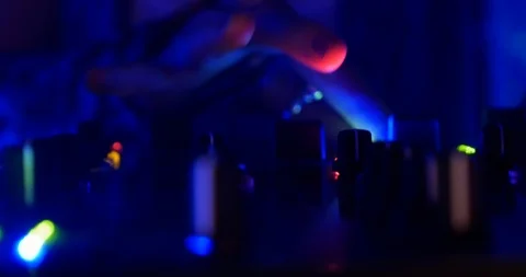 Close up of dj hands adjusting and mixing sound at electronic music festival Stock Footage 121711627