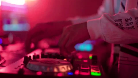 Close up DJ hands on mixer slow motion 50fps Video stock 156027463