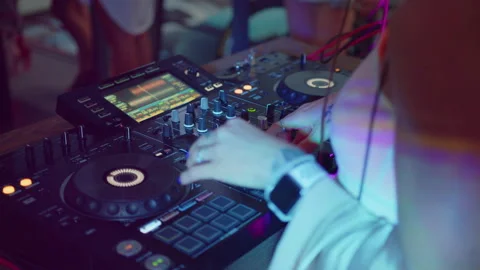 Close up. DJ sound control console for mixing dance music in disco club. Hands Stock Footage 159422871
