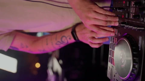 Close up DJ using controller console to mix music list in club Stock Footage 201495042