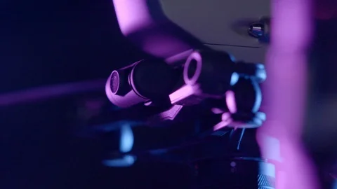 Close-up of DJI Inspire 2 drone with zoom lense in purple lighting Stock Footage 129289038