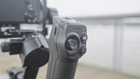 Close-Up of DJI RS 5 Briefcase Handle and Record Button Stock Footage 331974755