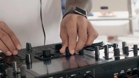 Close-up of a DJ's hands at work with a remote control Stock Footage 250021738