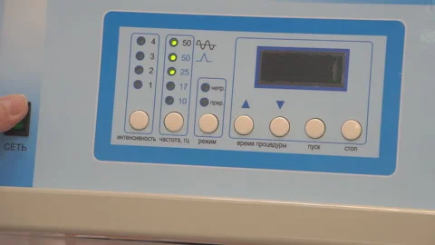 Close-up of doctor's hand on the instrument panel of medical equipment. Close-up Stock Footage 96603815