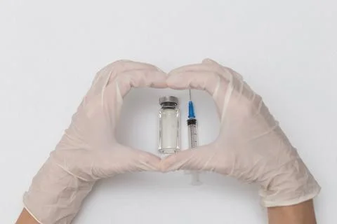 Close-up of a doctor's hands with a bottle and a vaccine, Medical concept vac Stock Photos