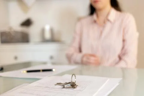 Close up of documents and keys. Interview for rent. Concept of leasing and .. Stock Photos