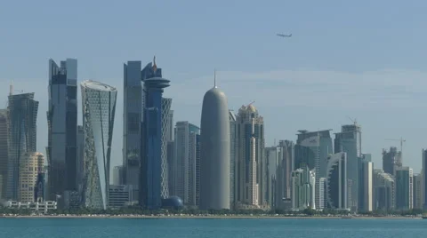 Close up from Doha Qatar skyline with an airplane in the background Stock Footage 62964930
