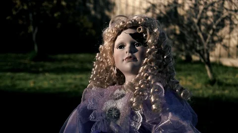 Close up of doll with a cracked head. Stock Footage 109589336