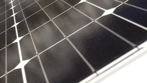 Close-up dolly camera move on solar panels mounted on Utah building. Stock Footage 99471363