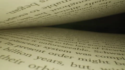 Close Up Dolly Macro Shot Inside Book #3 Stock Footage 254725465