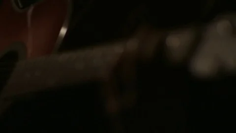 Close up dolly shot of hands playing guitar Stock Footage 71136559