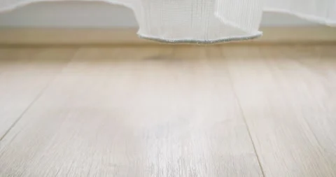 Close-up dolly shot of modern laminate flooring in a domestic interior Stock-Footage 325654060