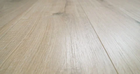 Close-up dolly shot of modern oak laminate flooring in a domestic interior Stock-Footage 325654082