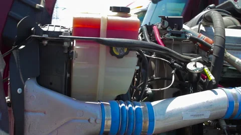 Close up dolly track of open freight liner truck engine parts 스톡 동영상 60032730