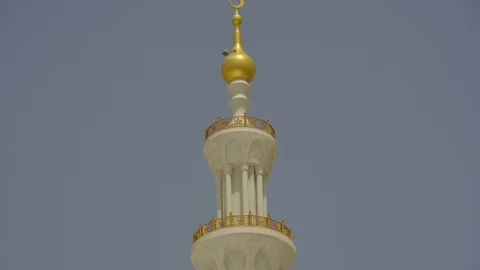 Close-up of domes  with Islamic sign on the top of Sheikh Zayed Mosque Stock Footage 104860266