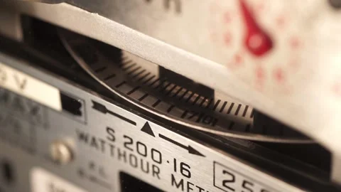 Close-up of a domestic electric meter and dial turning. Stock Footage
