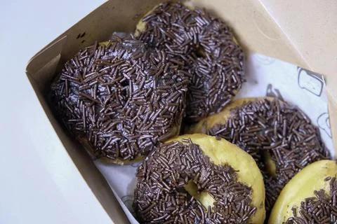 Close-up of donut with chocolate sprinkle Stock Photos