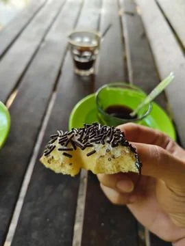 Close up of donut in hand Stock Photos