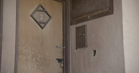 Close up on Door of Abandoned Motel Stock Footage 89942934
