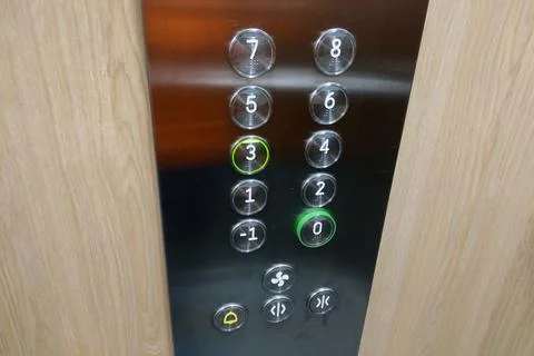 Close Up of a Door With Buttons Foto stock