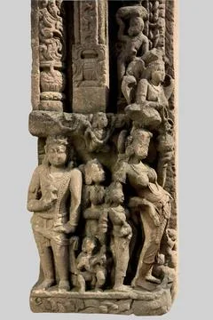 Close up of door frame with human figures and decorative elements depicted... Stock Photos