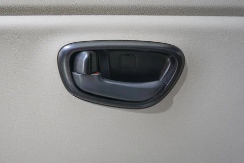 Close-up door handle with car lock inside Stock Photos