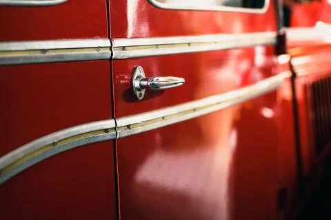 Close-up of door handle of old fire truck. Stock Photos