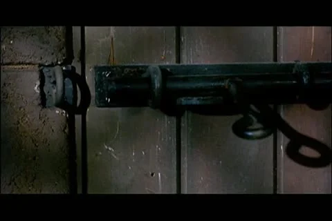 Close-up door mysteriously locking Stock Footage